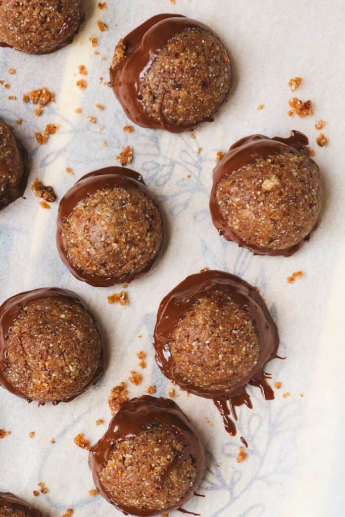 cashew, almond and date balls dipped in dark chocolate