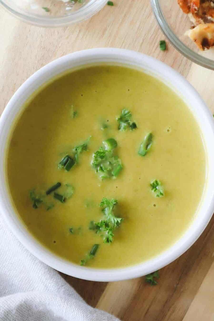 asparagus and sweet potato soup in a bowl