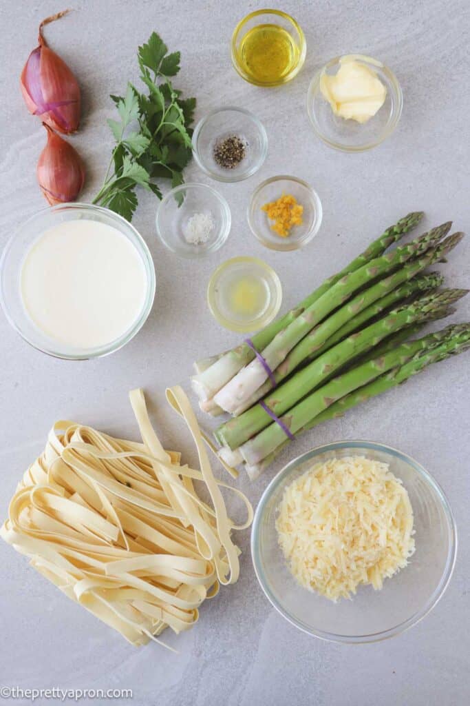 Ingredients for pasta alfredo with asparagus