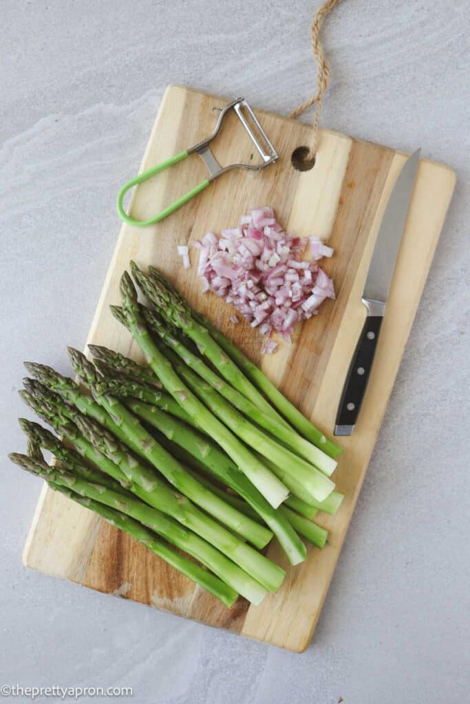 Peeled asparagus and chopped shallots