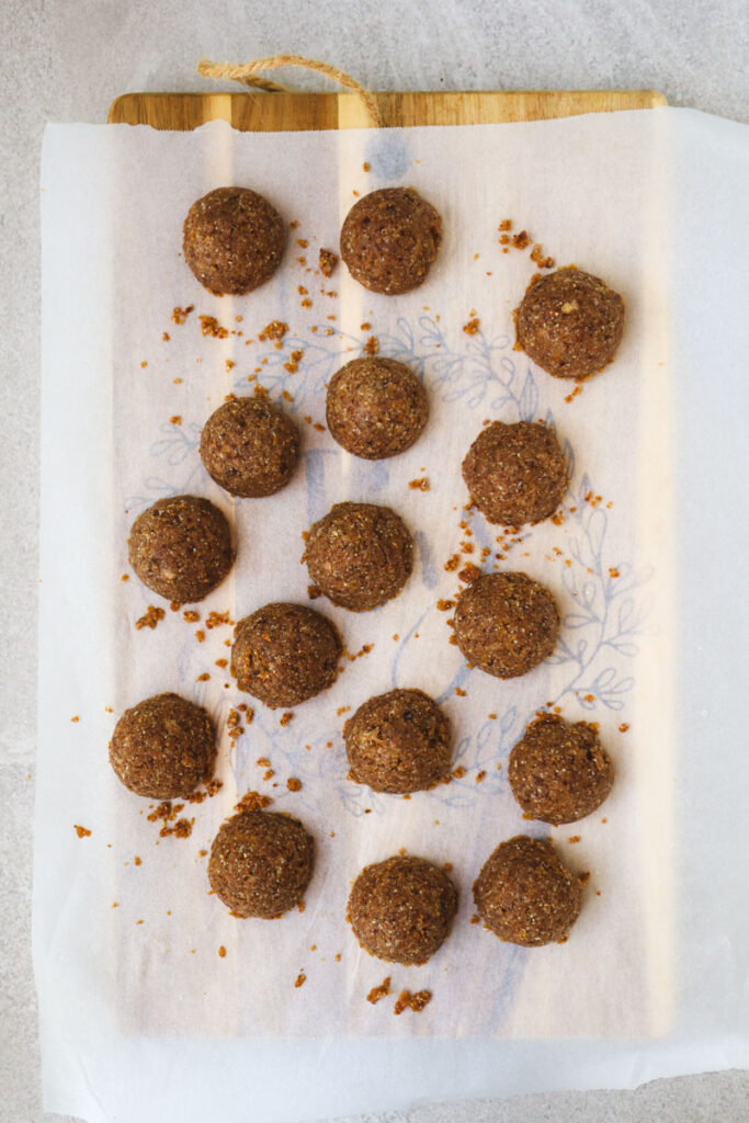 Tablespoons of mixture on parchment paper