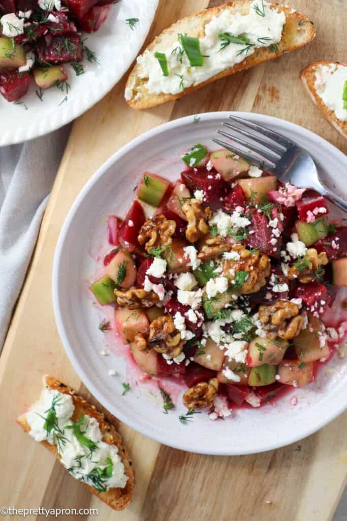 Cucumber beets salad served with whipped lemon ricotta bruschetta