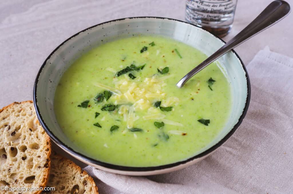 creamy broccoli and asparagus soup with grated parmesan and italian parsley