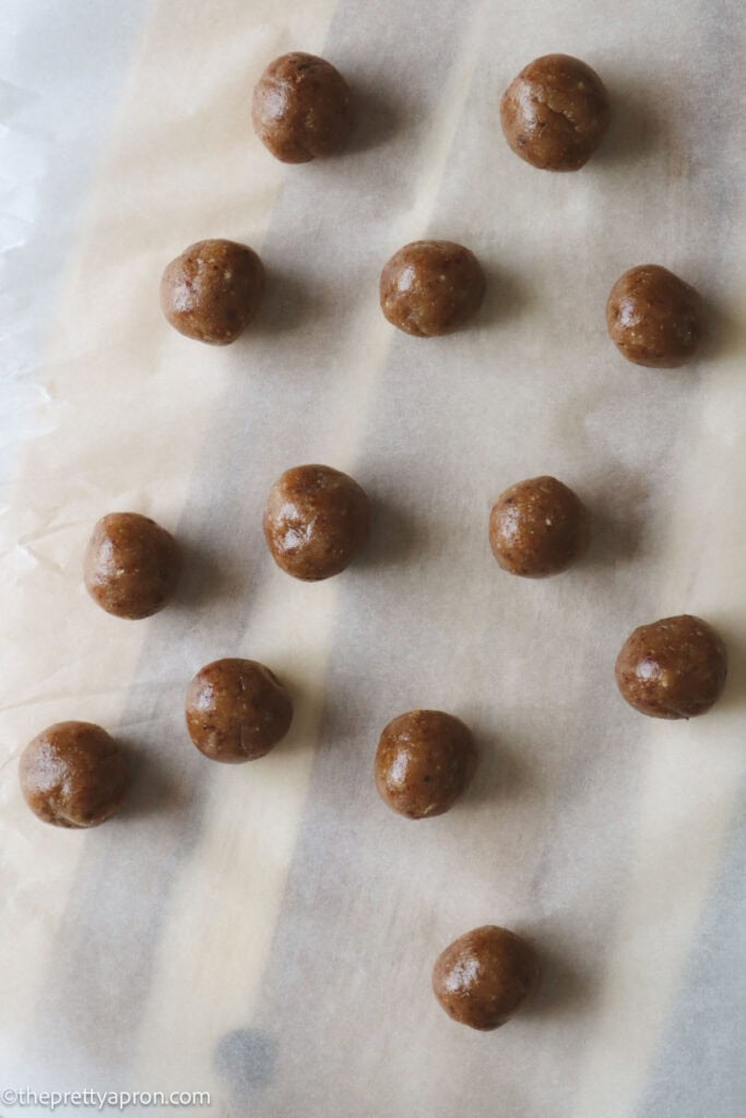 Lemon cashew balls without coating on parchment paper