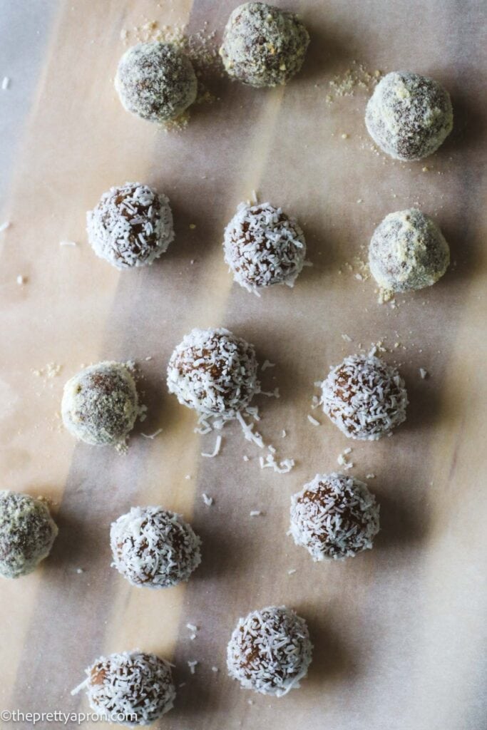 Lemon cashew balls coated in cashew meal or shredded coconut