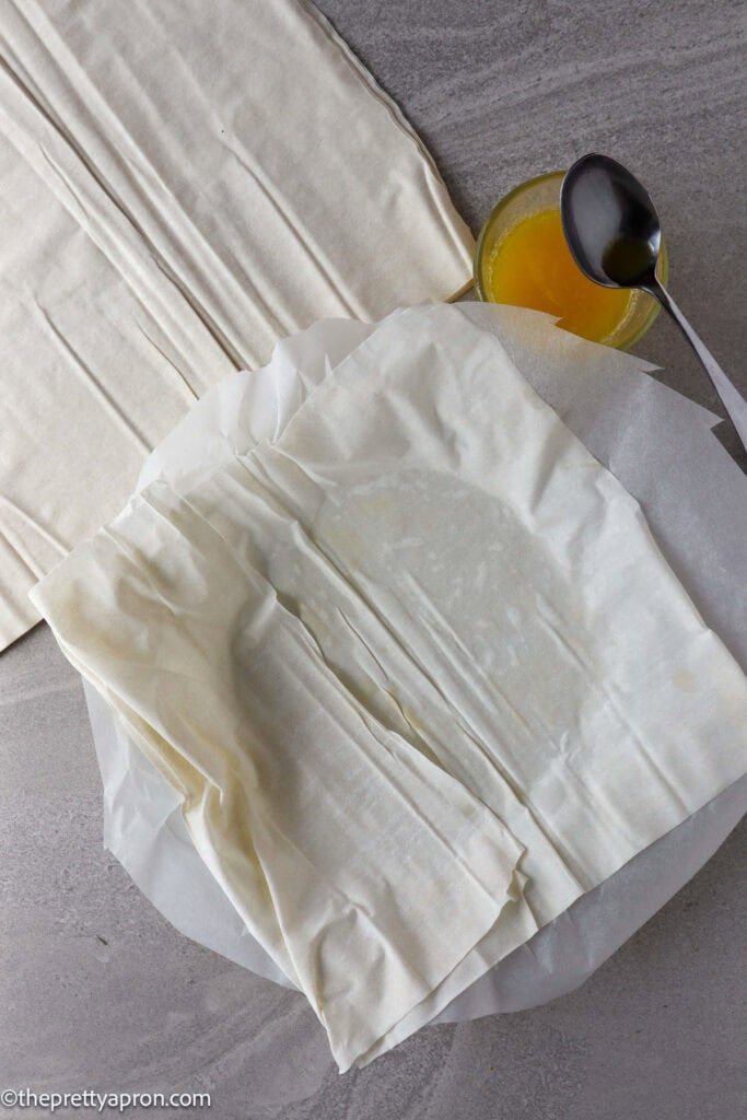 Single sheet of phyllo dough on quiche dish