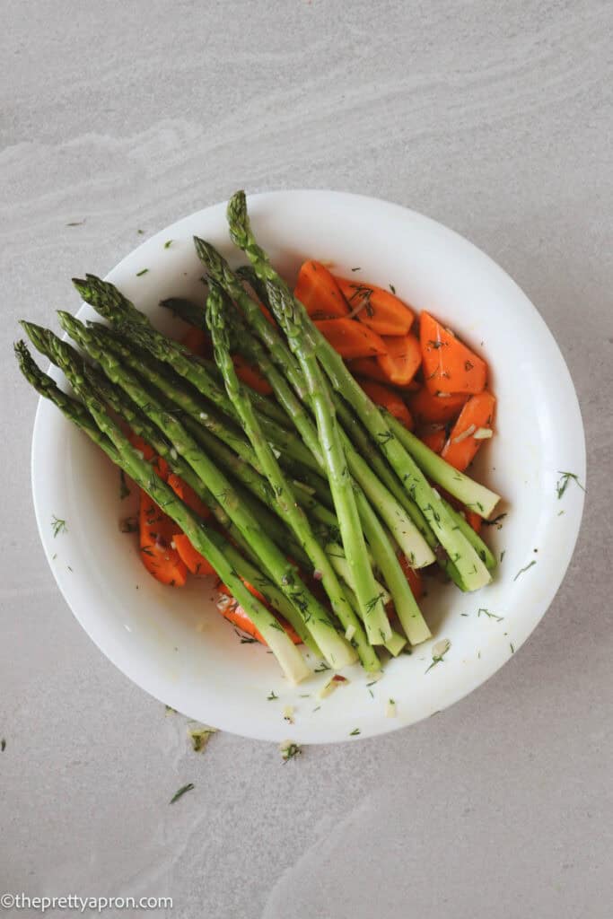 Asparagus and Carrots mixed with olive oil, shallots, garlic, dill and salt and pepper