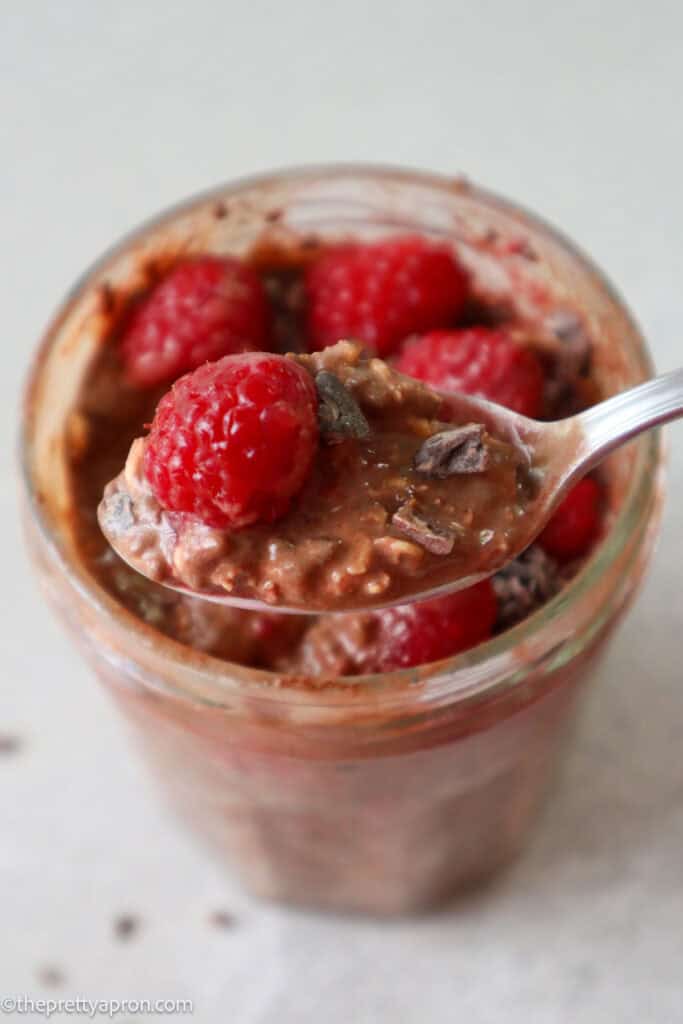 Spoonful of chocolate raspberry overnight oats