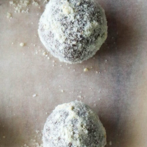 Lemon cashew bliss ball coasted in ground cashews