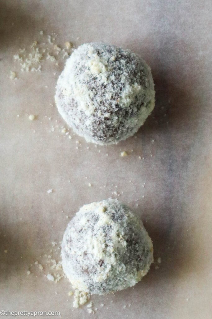 Lemon cashew bliss ball rolled in finely ground cashew meal